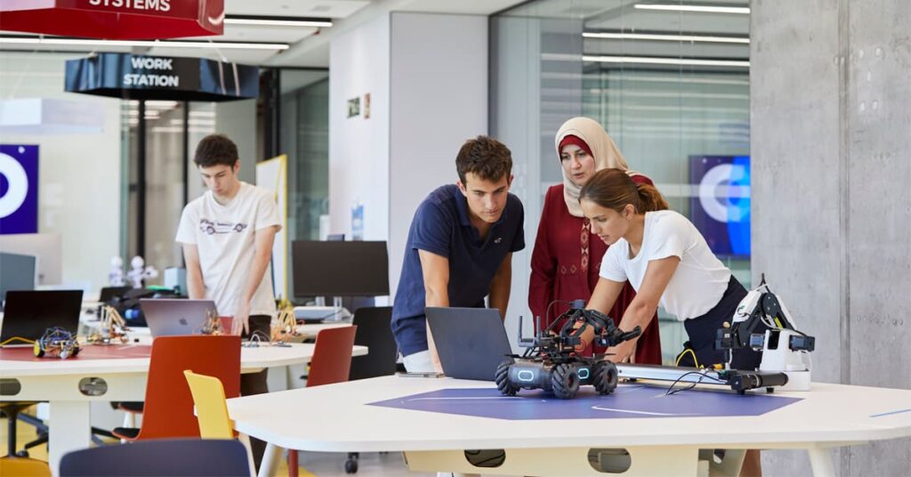 students and robots IE Tower||||||